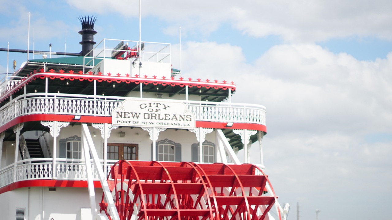 The red and white City of New Orleans riverboat